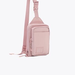 BEIS Pink Crossbody Bag with Adjustable Strap and Modern Design